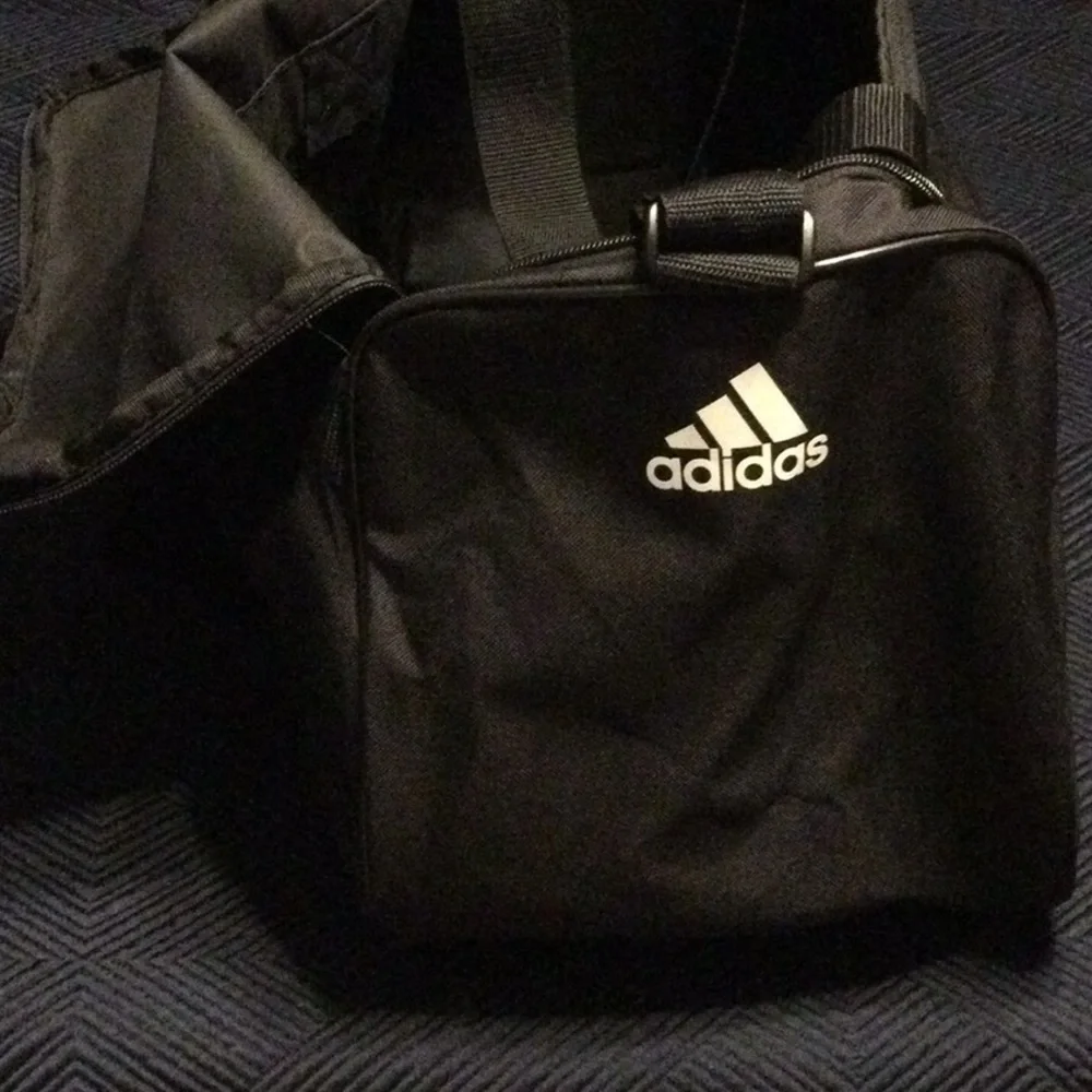 Adidas black canvas duffel bag